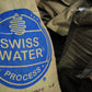 Adventure Dog Coffee's proud partnership with the Swiss Water Process. This bag of Swiss Water Processed coffee beans is a symbol of our commitment to using the Swiss Water Process for decaffeinating our coffee beans ensures a chemical-free and environmentally friendly approach to producing decaf coffee. 