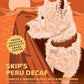 Skip the Westhighland Terrier featured on the label of Skip's Single Origin Peru Decaf Coffee, described as full-bodied, low-acid coffee with floral aroma and salted caramel overtones.